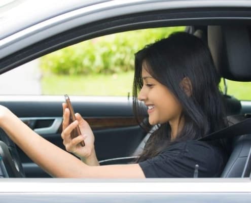 can you text while stopped at a red light